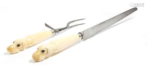 Λ A Victorian ivory and steel carving set, the han…