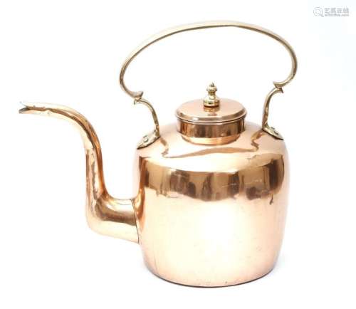 A large Victorian copper kettle, with a brass hand…