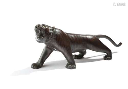 A Japanese bronze model of a snarling tiger, with …
