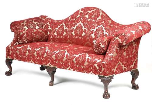 A Victorian mahogany serpentine three seater sofa …