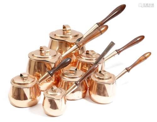 Λ A graduated set of five Victorian copper brandy …