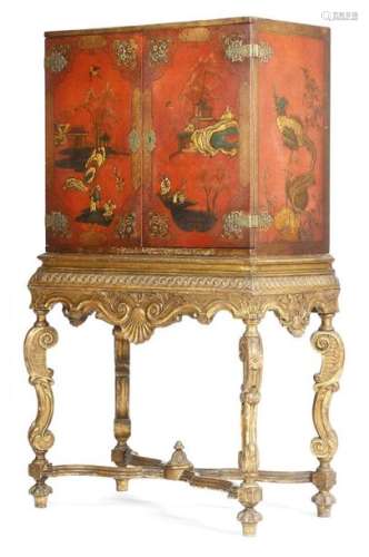 A red japanned and giltwood cabinet on stand in ea…