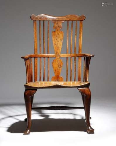 A mid 18th century and later yew Windsor armchair …