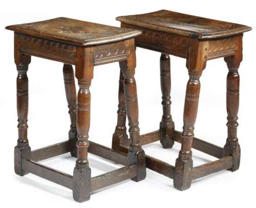 A pair of Charles I oak joint stools attributed to…