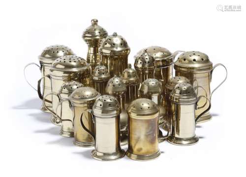 A collection of seventeen brass muffineers / shake…