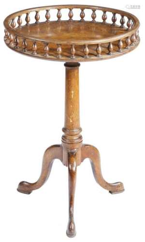 A walnut tripod table in George II style, the burr…