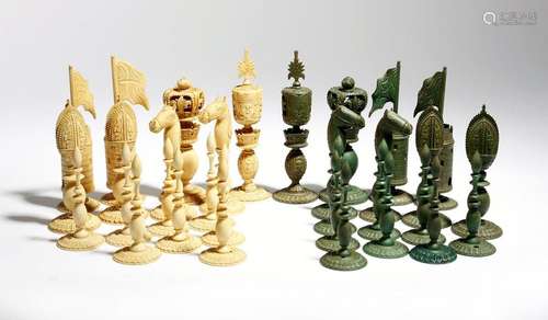 Λ A Burmese carved ivory matched chess set, the ki…