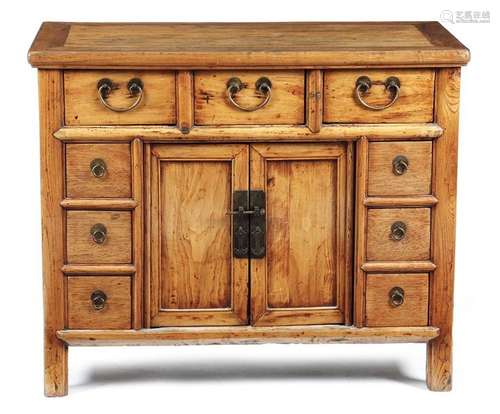 A Chinese elm side cabinet, the panelled top above…