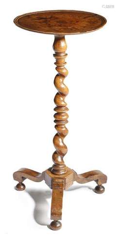 An early 18th century walnut candlestand, the dish…