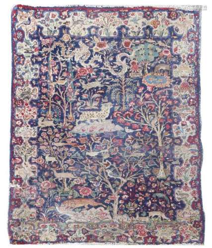 A Kerman pictorial rug, decorated with trees, anim…
