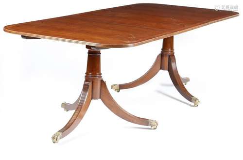 A mahogany twin pedestal dining table by Arthur Br…