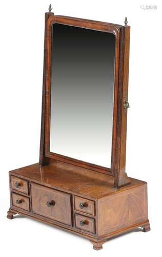 A George II walnut dressing table mirror, the arch…