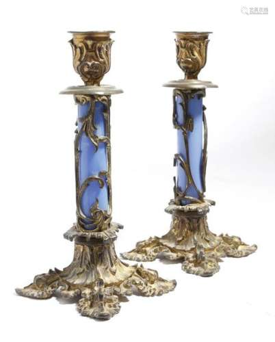 A pair of early Victorian gilt bronze candlesticks…