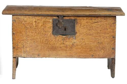 A small early 17th century oak boarded coffer, wit…