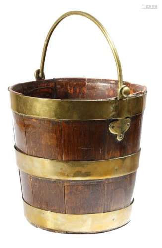 A 19th century oak and brass bound bucket, of stav…