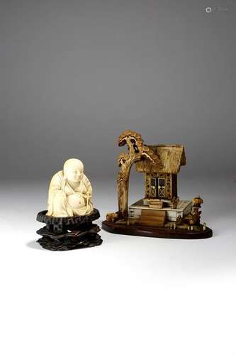 Λ A Chinese carved ivory figure of happy Buddha, 7…