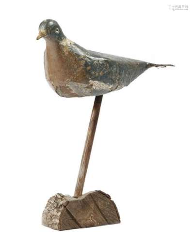 A painted tôle decoy pigeon, with glass eyes, with…