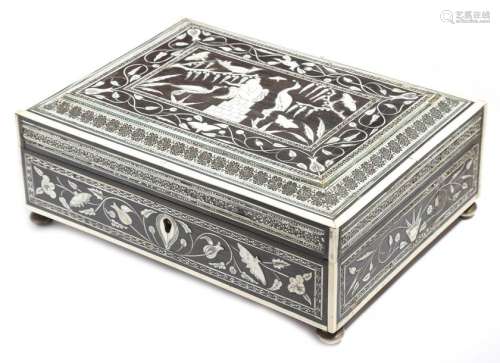 Λ An Anglo Indian ebony and ivory box, of sarcopha…