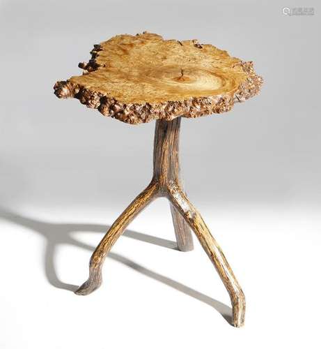 A primitive burr wood table, the rustic ash top on…