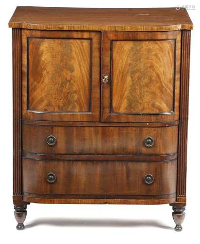 An early 19th century mahogany barrel front cabine…