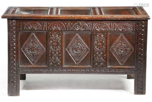 A Charles II oak coffer, the triple panelled top r…