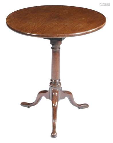 A George II mahogany tripod table, the circular ti…