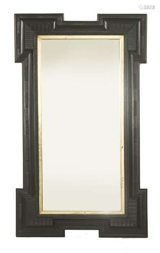 An ebonised rectangular wall mirror, with outstepp…
