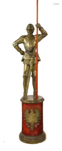 A brass figure of a knight in armour, early 20th c…