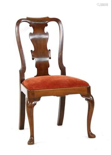 A George II walnut dining chair, with a vase shape…