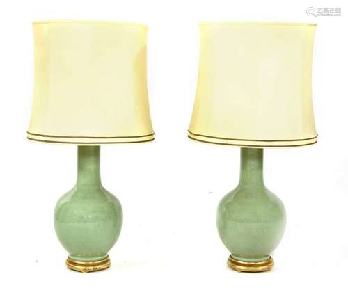 A pair of large celadon glazed table lamps, 20th c…