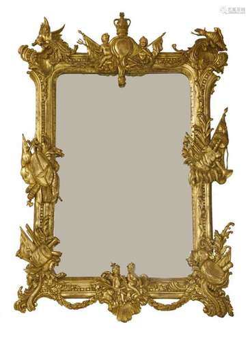 A carved gilt wall mirror, early 19th century styl…