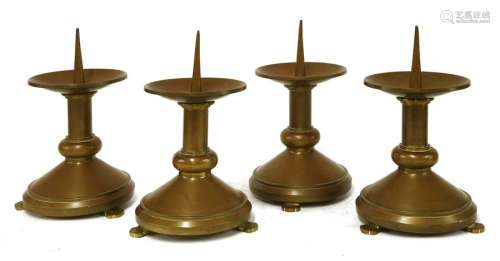 A set of four brass pricket candlesticks, 19th cen…