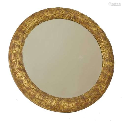 A carved giltwood circular wall mirror, 20th centu…