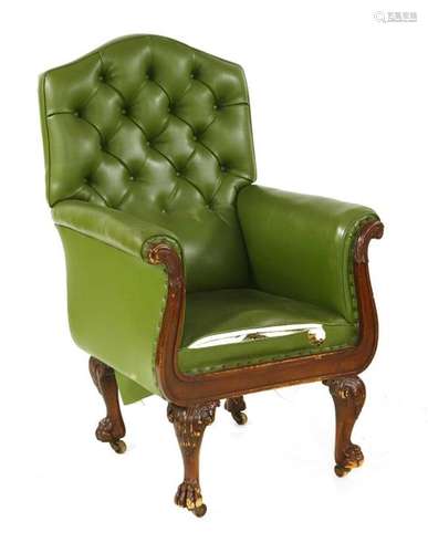 A carved mahogany and green leatherette upholstere…