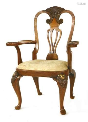An American walnut open armchair, 18th century sty…