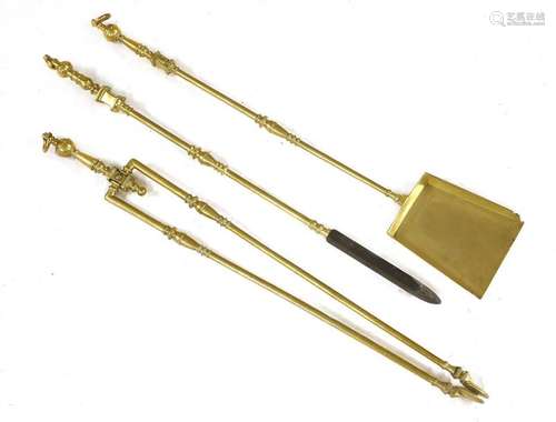 A set of three brass fire irons, late18th century,…