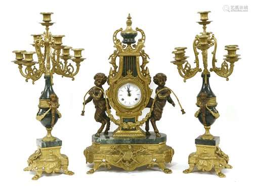 A Louis XV style clock garniture, of lyre form wit…