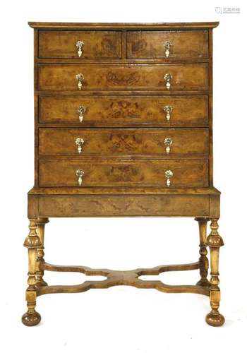 A walnut chest on stand, 18th century and later, t…