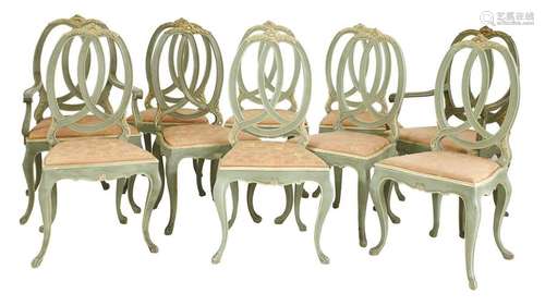 A set of ten French green and cream painted dining…