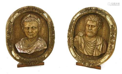 A pair of carved walnut roundels, late 19th centur…