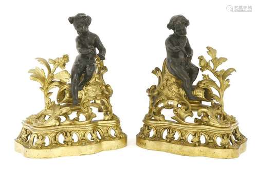 A pair of French bronze and gilt metal chenet, eac…