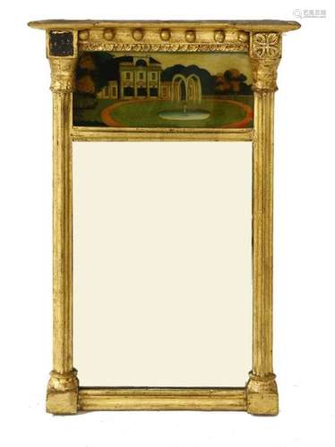 A Regency giltwood and verre églomisé mirror, the …