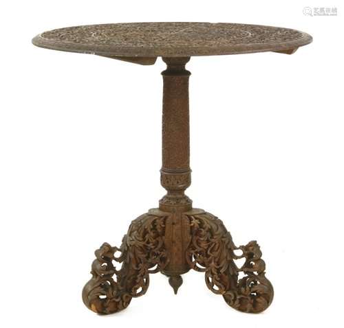 An Indian hardwood centre table, 19th century, the…