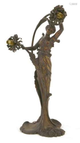 An Art Nouveau spelter two light table lamp, in th…
