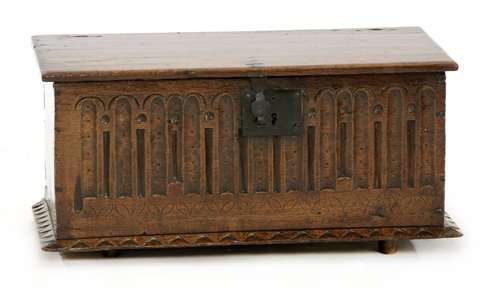 An oak box, late 17th century, the hinged chamfere…