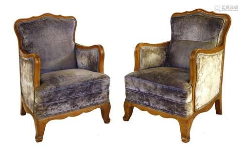 A pair of French beechwood armchairs, 19th century…