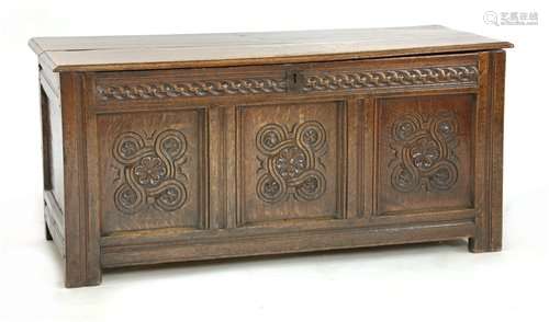 An oak coffer, late 17th century, the hinged mould…