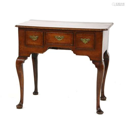 An early George II oak and crossbanded lowboy, wit…