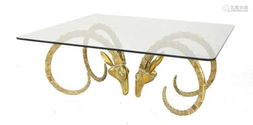 A contemporary brass and glass coffee table, the s…