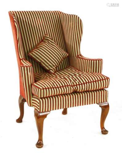 A George III style wing back armchair, with stripe…